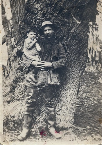 James Franklin Steelman holding Kathryn Mae Steelman ab 1 yr.old